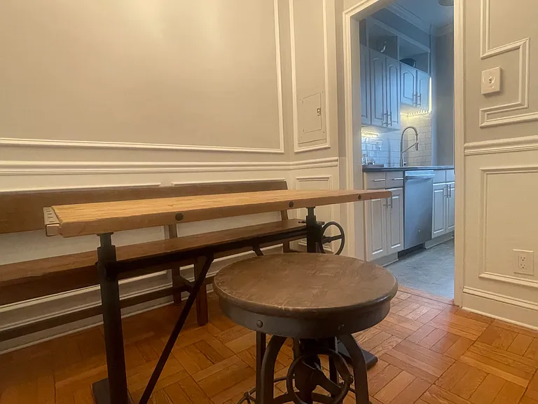 Dining nook adjacent to the galley kitchen.