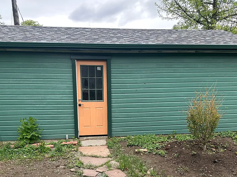 Large insulated garage/shop with 220 electrical capacity. Window to be installed soon.