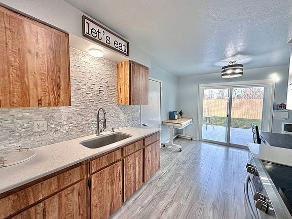 Kitchen with walk-out patio