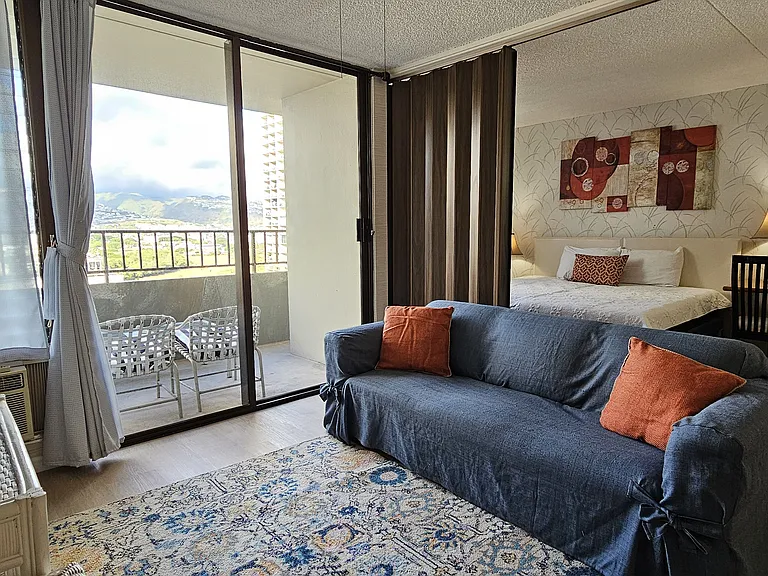 Sliding accordion door to separate bedroom from living room