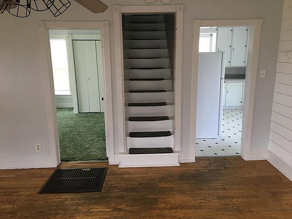 Living room and stairway to second floor