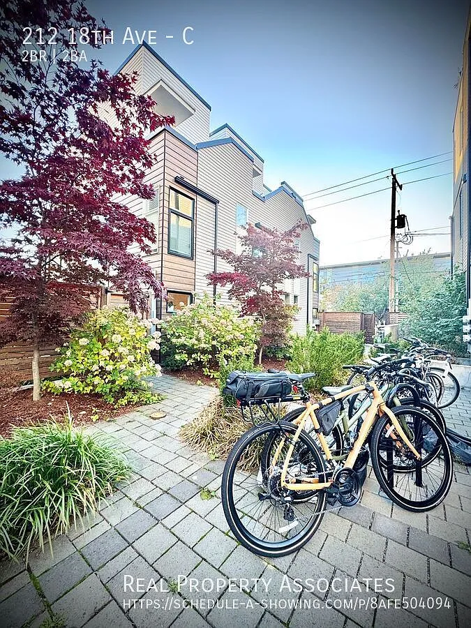 Modern Elegance Meets Urban Comfort Stunning 2 Bed / 2 Bath Townhouse with Rooftop Deck & Gated P... — Photo 3