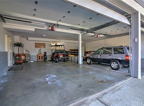 Oversized 4 Car Plus Finished Garage with High Roll-up Doors for Boat / RV.....Full Bathroom for Bea