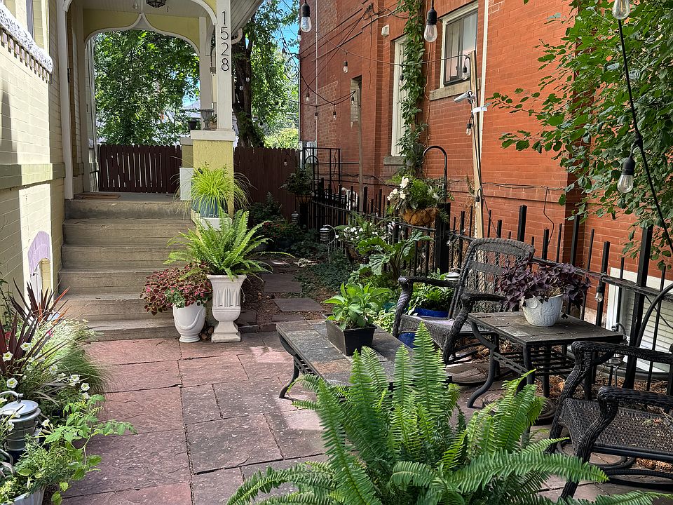 Side yard terrace and front door