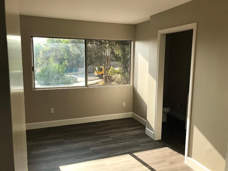 Primary bedroom. Window faces west