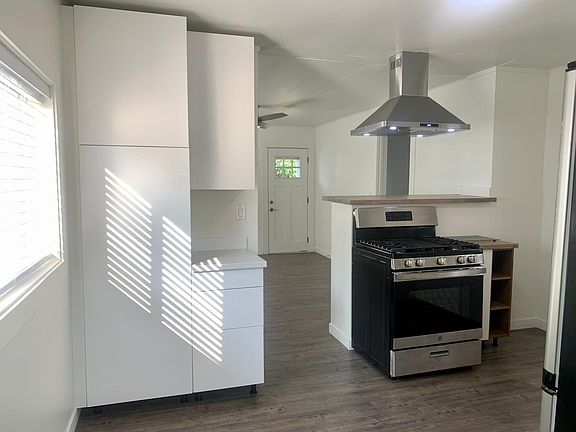 kitchen pantry and stainless range