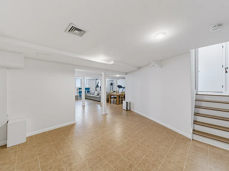 LOWER LEVEL-GYM/ENTERTAINING ROOM