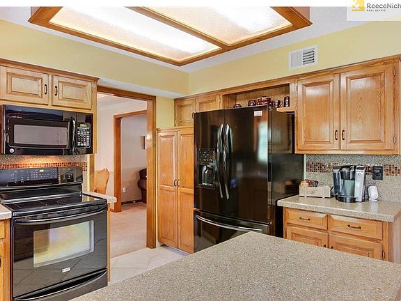 This Kitchen is the Heart of the Home!   Plenty of Cabinets, Pantry & counter space.