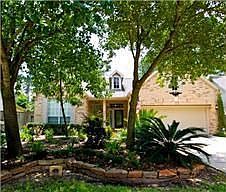 Beautifully landscaped patio home, sited on premium cul-de-sac lot across from small park.