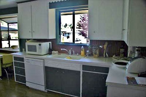 Eat-in Kitchen windows look onto front yard