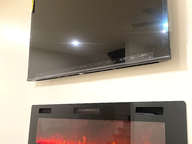 65" Included TV and 60" Electric Fireplace
