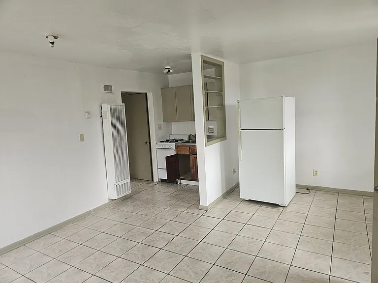 Kitchen/Dining area. Williams Wall furnace.