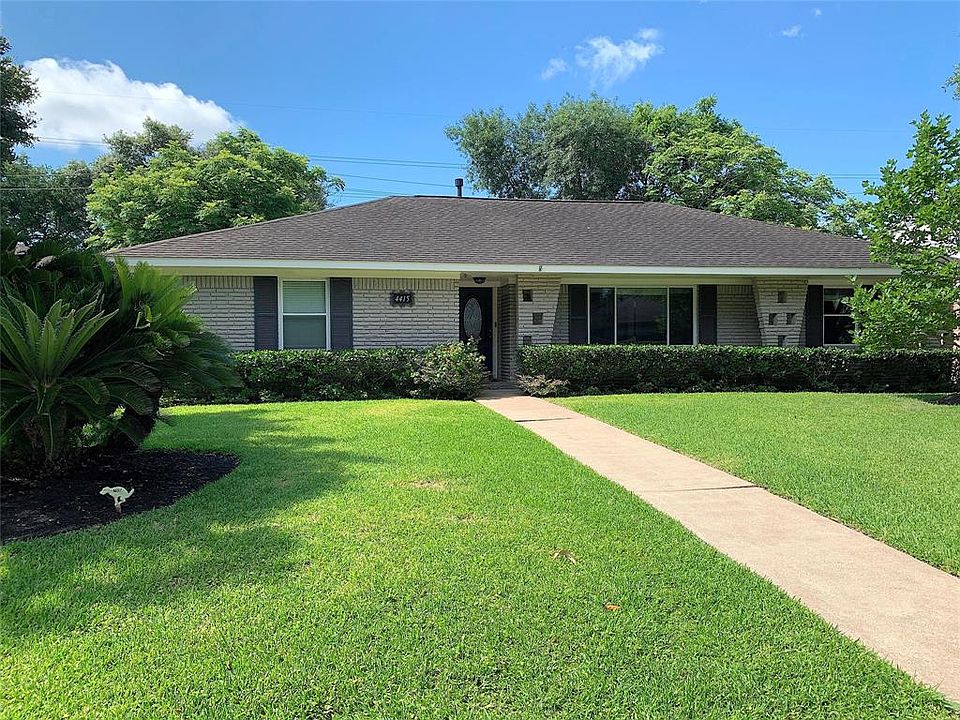Gorgeous brick house with lots of updates. Never flooded. Double-paned windows throughout! Under eaves recessed lights across the front.
