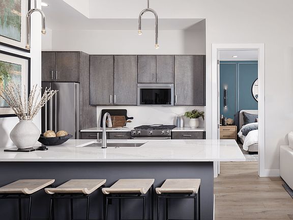 The Kingfisher kitchen blends style and function with a spacious layout, modern finishes, and though
