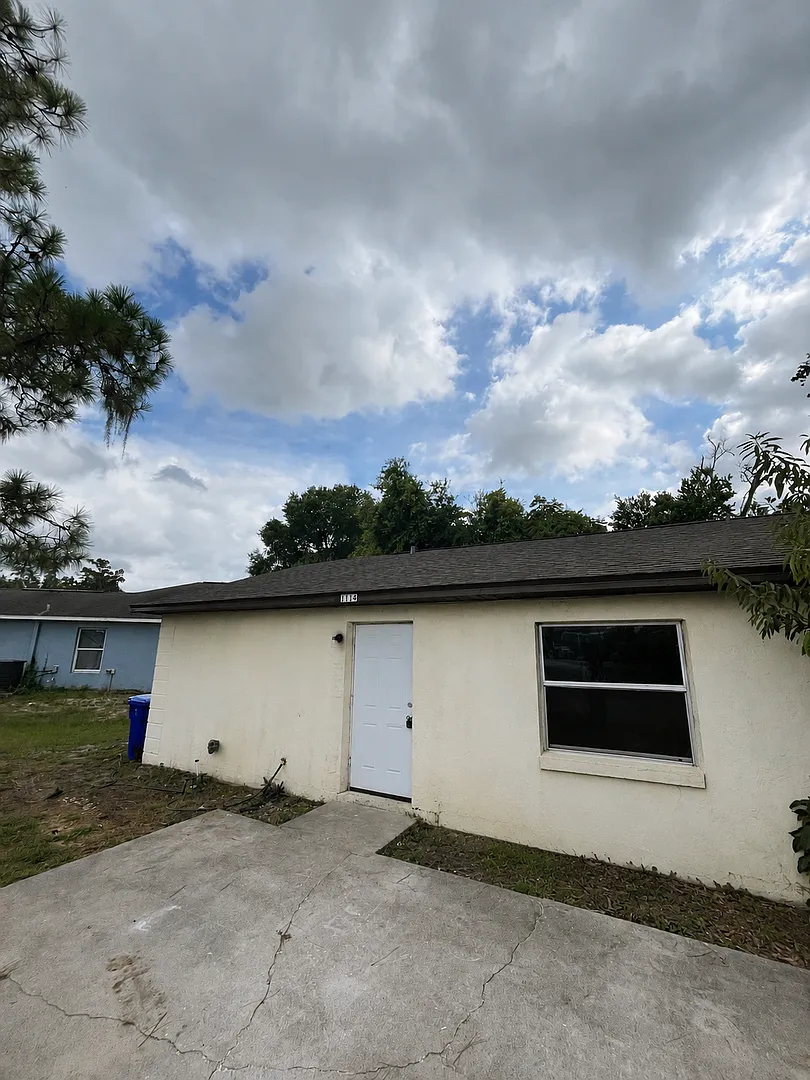 Spacious 2BR/1BA Duplex in Central Lakeland Tile Floors Throughout! — Photo 1