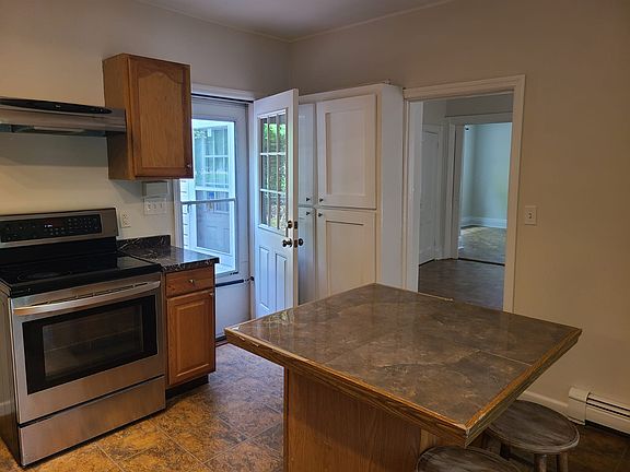 Main entrance through kitchen.