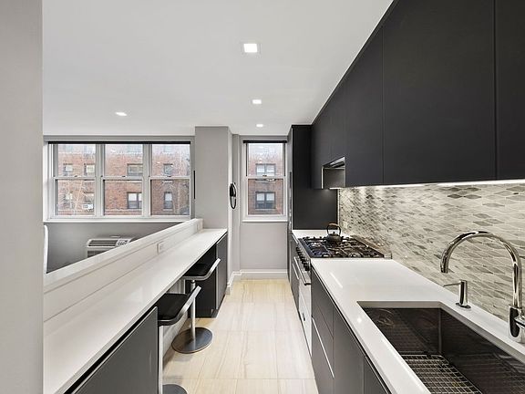 3rd image of 63 E 9th St APT 3R