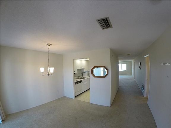 View of dining room and hall way upon entering
