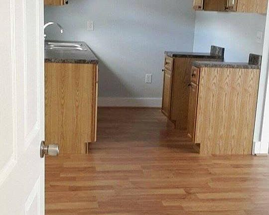Kitchen (includes stove & refrigerator)