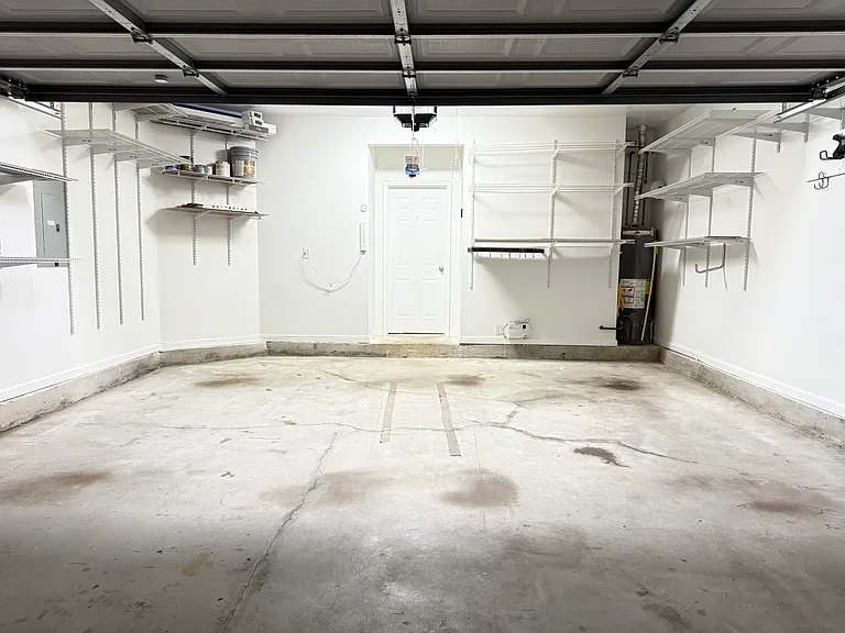 Garage (lots of shelving for storage)