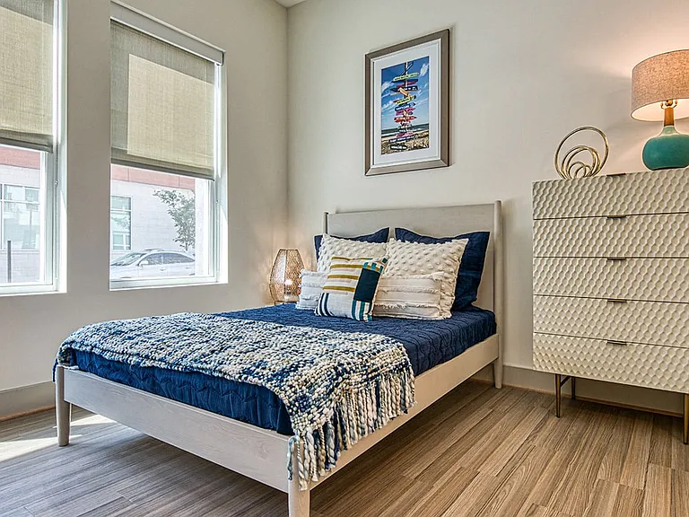 Wood finish plank flooring in bedrooms