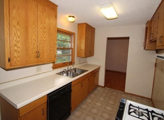 Waiver of Sellers Disclosures - Property sold AS-IS, buyer to comply city repair requirements.