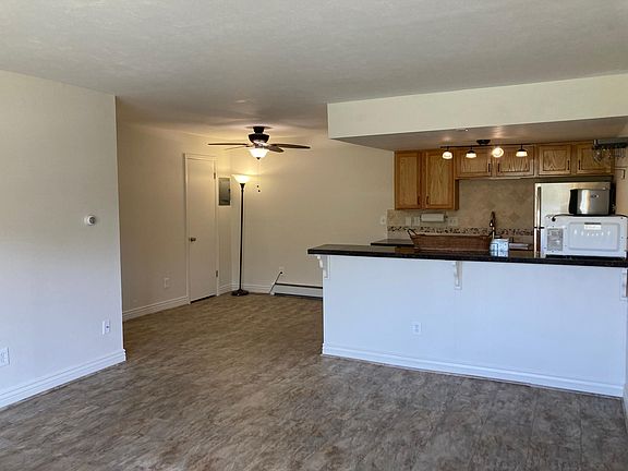 Living room, dining room and kitchen with pantry
