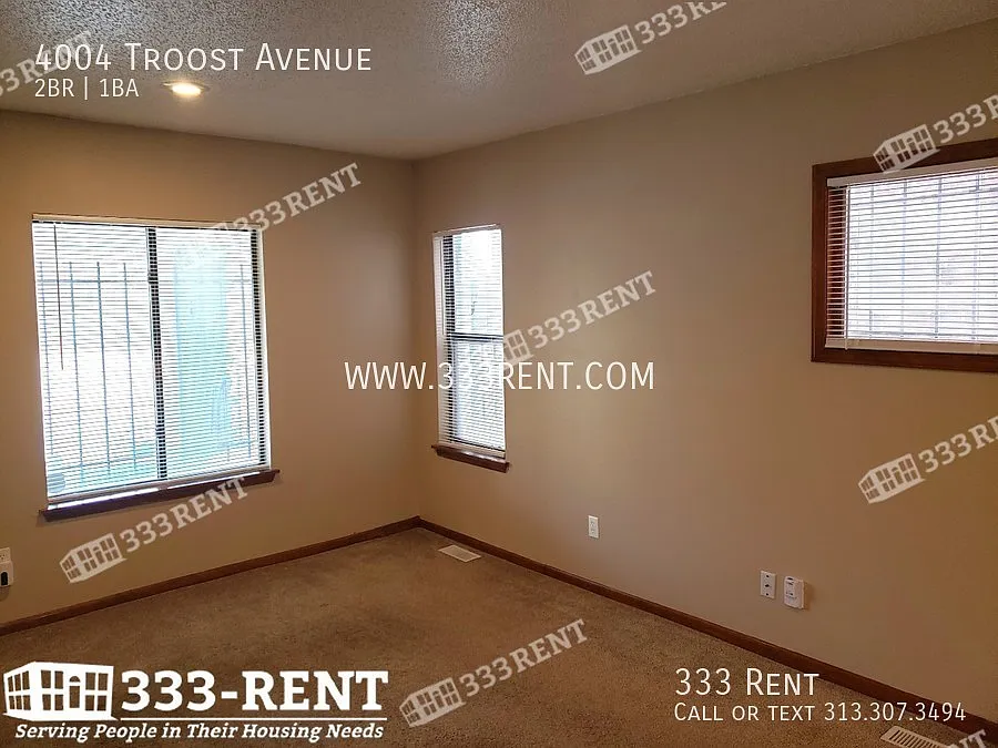 Large converted duplex close to UMKC & Rockhurst with old-world charm and stunning extras through... — Photo 3
