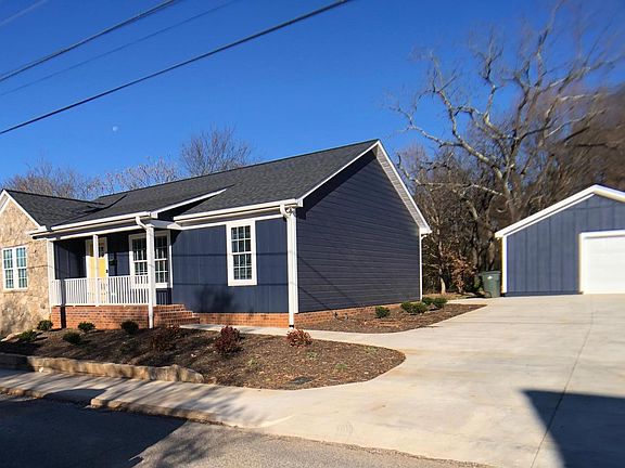 Front View with detached Garage/Workshop (Finished)