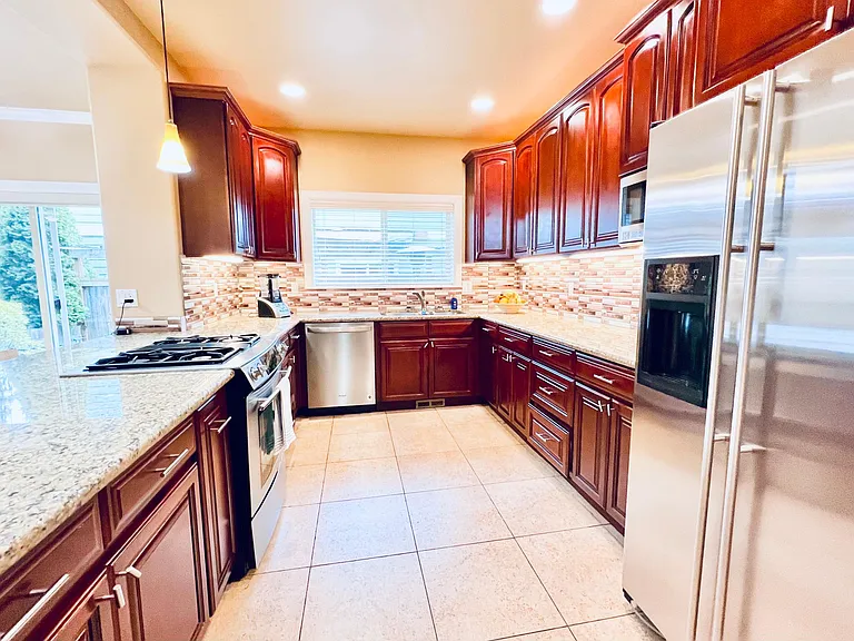 Kitchen with included appliances