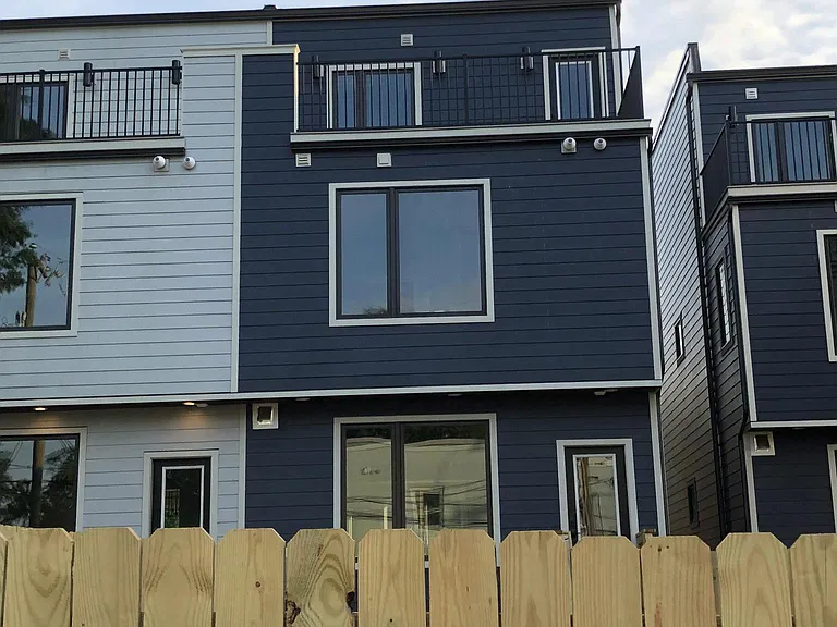 Dedicated parking spots and entrance to back yard