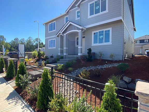 Wooded landscaping included and maintained by the association. This is the view with our unit on the right.