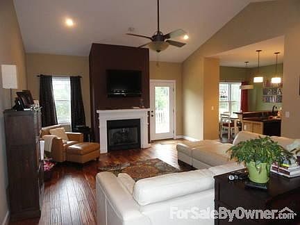 Great Room
						:
						Hardwood floors throughout great room, gas logs fireplace with TV mount above