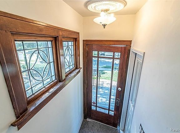 Front door with staircase up to your unit.