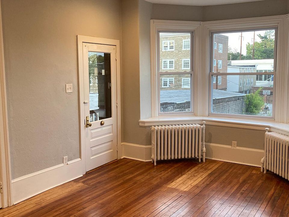 Main entrance and living room with hardwood floors, recessed lighting and new ceiling fan