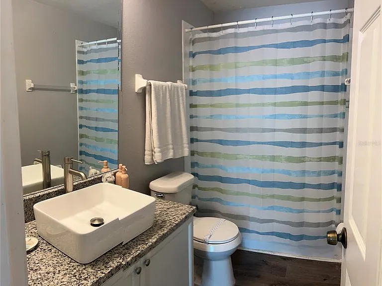 8121 Fan Palm Way — Photo 35