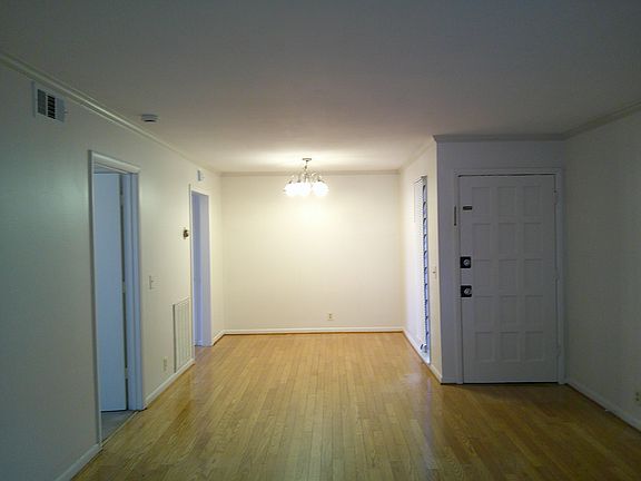 Open floor plan with hardwood floors. Dining/Great room combination