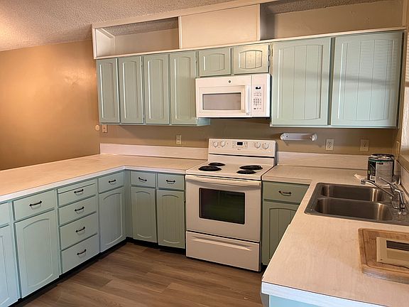 This is Kitchen with new classic sage green painting.