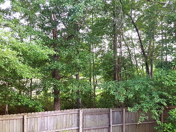 Fenced back yard, pond views