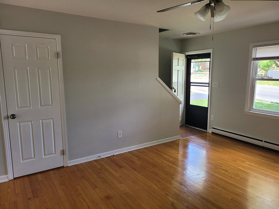 Living Room w/Half Bath entry door on left
