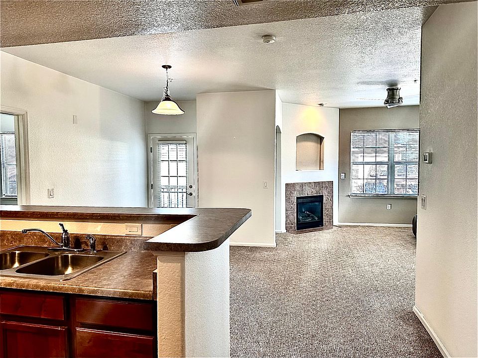 Gas fireplace in living room, open floorpan