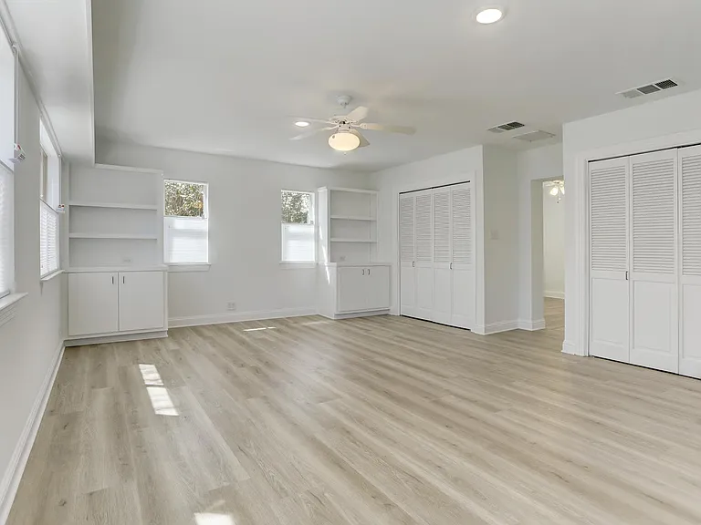 Huge primary bedroom with ample storage.