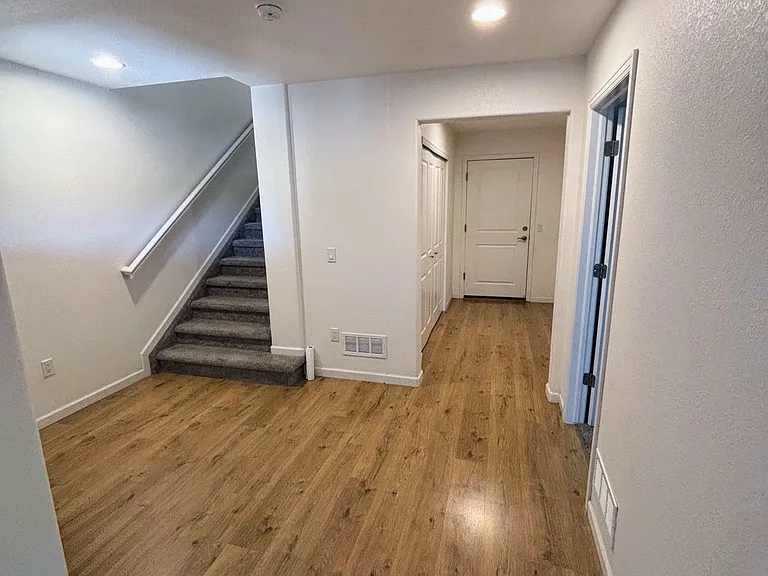 Flex space (1st floor) leading to attached 2-car garage
