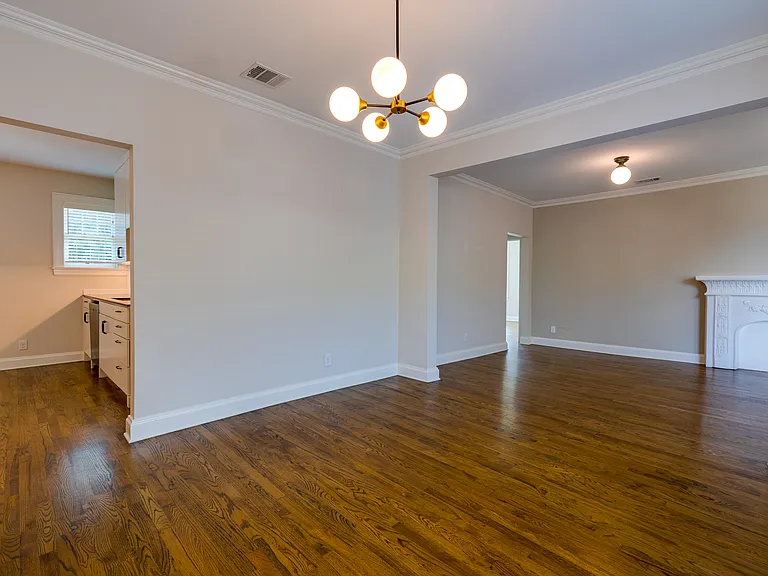 Alternate view of dining room. Kitchen located to the left