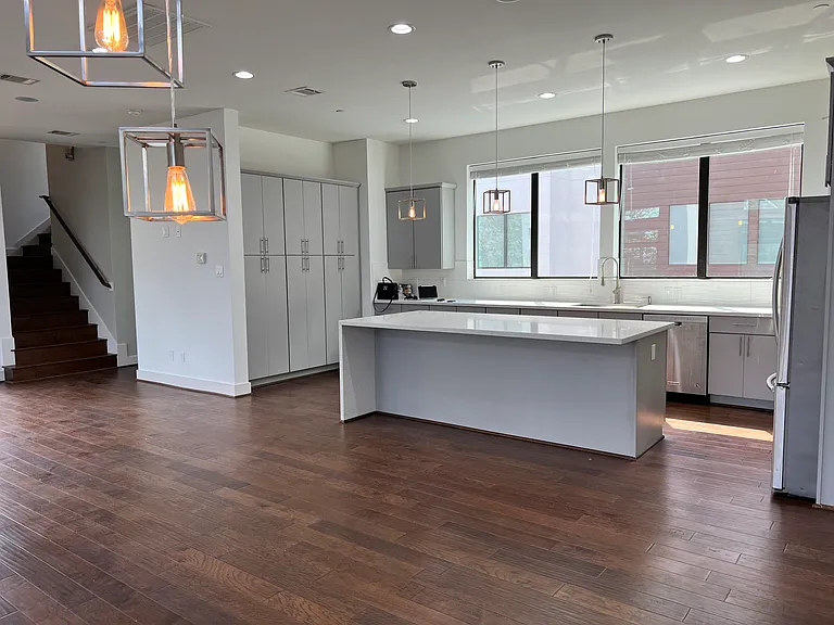 Large, open kitchen with oversized island.