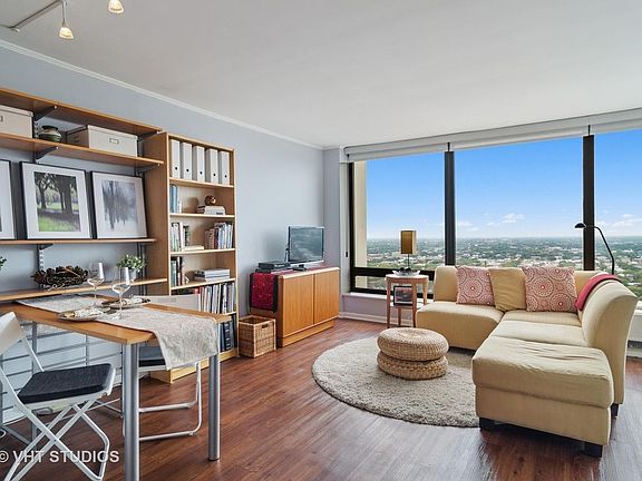 Unit unfurnished. Previous resident furniture, art shown.