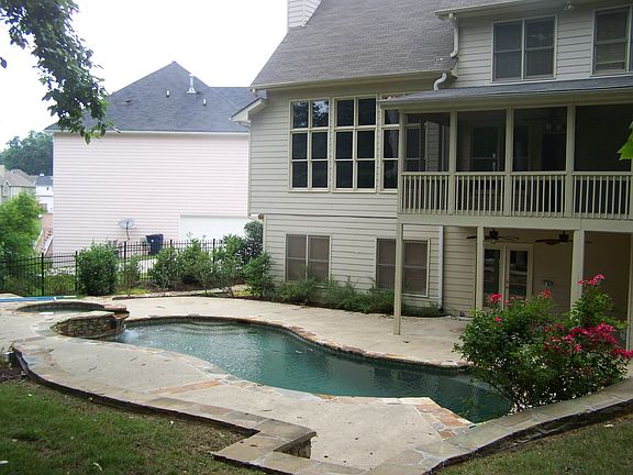 Backyard with in-ground pool & spa