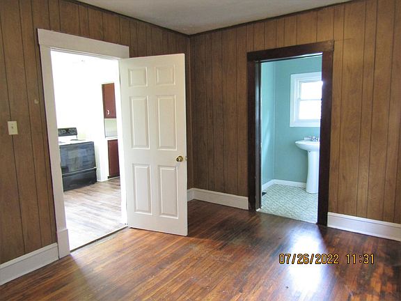 Dining Room beside kitchen & half bath could be used as third bedroom if desired