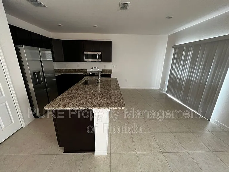 14193 SW 44th Ct — Photo 12