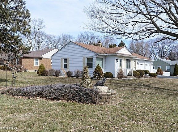 .25 acre corner lot with mature landscaping.